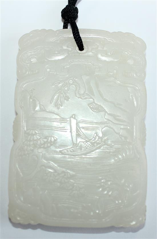 A Chinese white jade plaque, 19th/20th century, 6.5cm